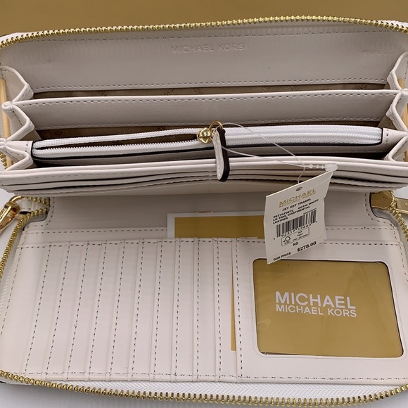 MICHAEL KORS LARGE TRAVEL CONTINENTAL WRISTLET WALLET OPTIC WHITE COLOR - Picture 9 of 16